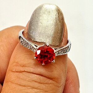 Ladies Ring with Stunning Red Stone surrounded by CZ Stones